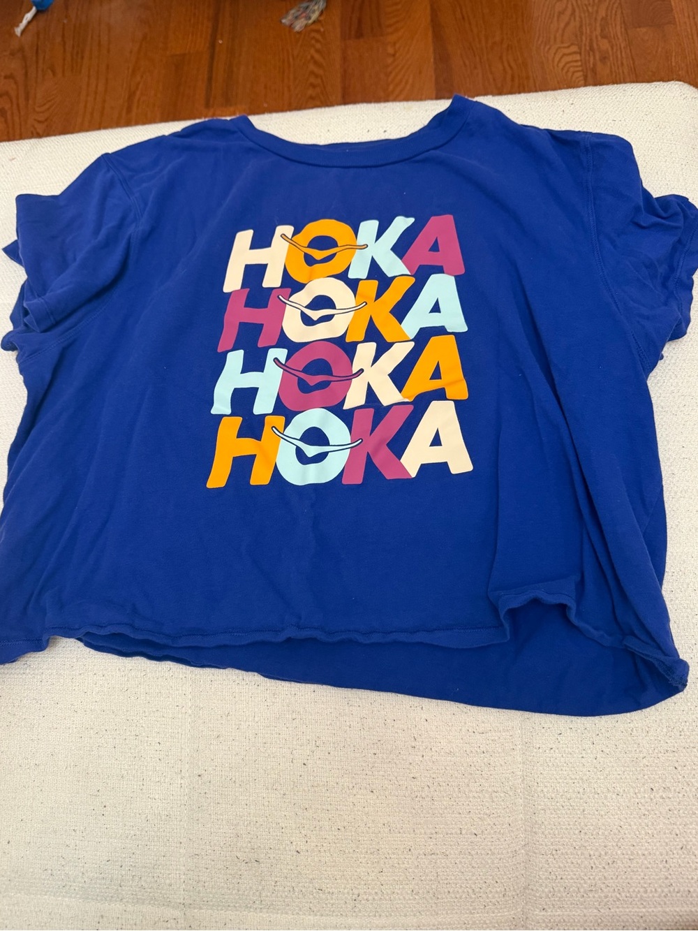 Hoka blue multicolor graphic logo cropped short sleeve shirt